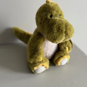 Knuffel zittende Dino